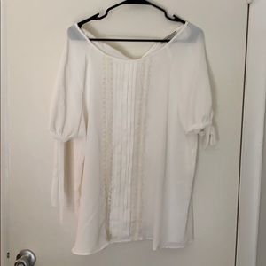White ruffle blouse